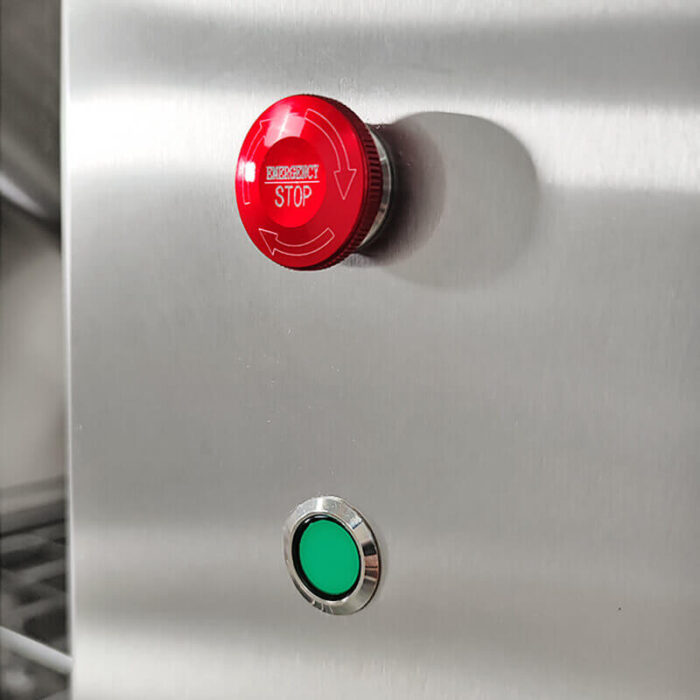 Emergency stop button for induction automatic stir fry machines.